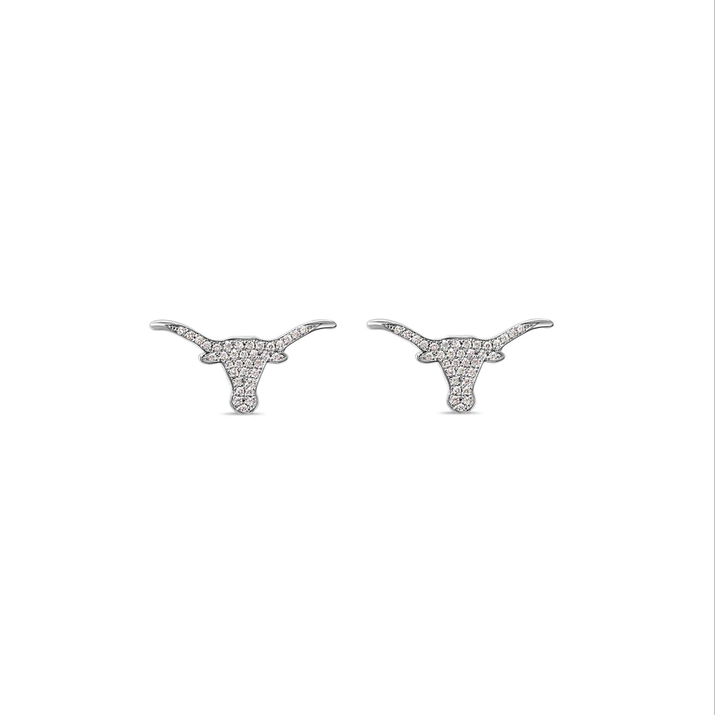 Pair of white gold longhorn stud earrings on a white background