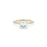 Sculpted Crescent Solitaire Engagement Ring with Round Diamond Band