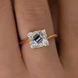 Tilted Sky Blue Sapphire with Diamond Frame Engagement Ring