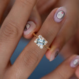 Tilted Sky Blue Sapphire with Diamond Frame Engagement Ring