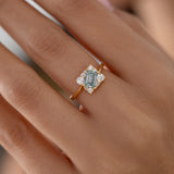 Tilted Sky Blue Sapphire with Diamond Frame Engagement Ring