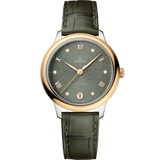 34 mm, steel - yellow gold on leather strap